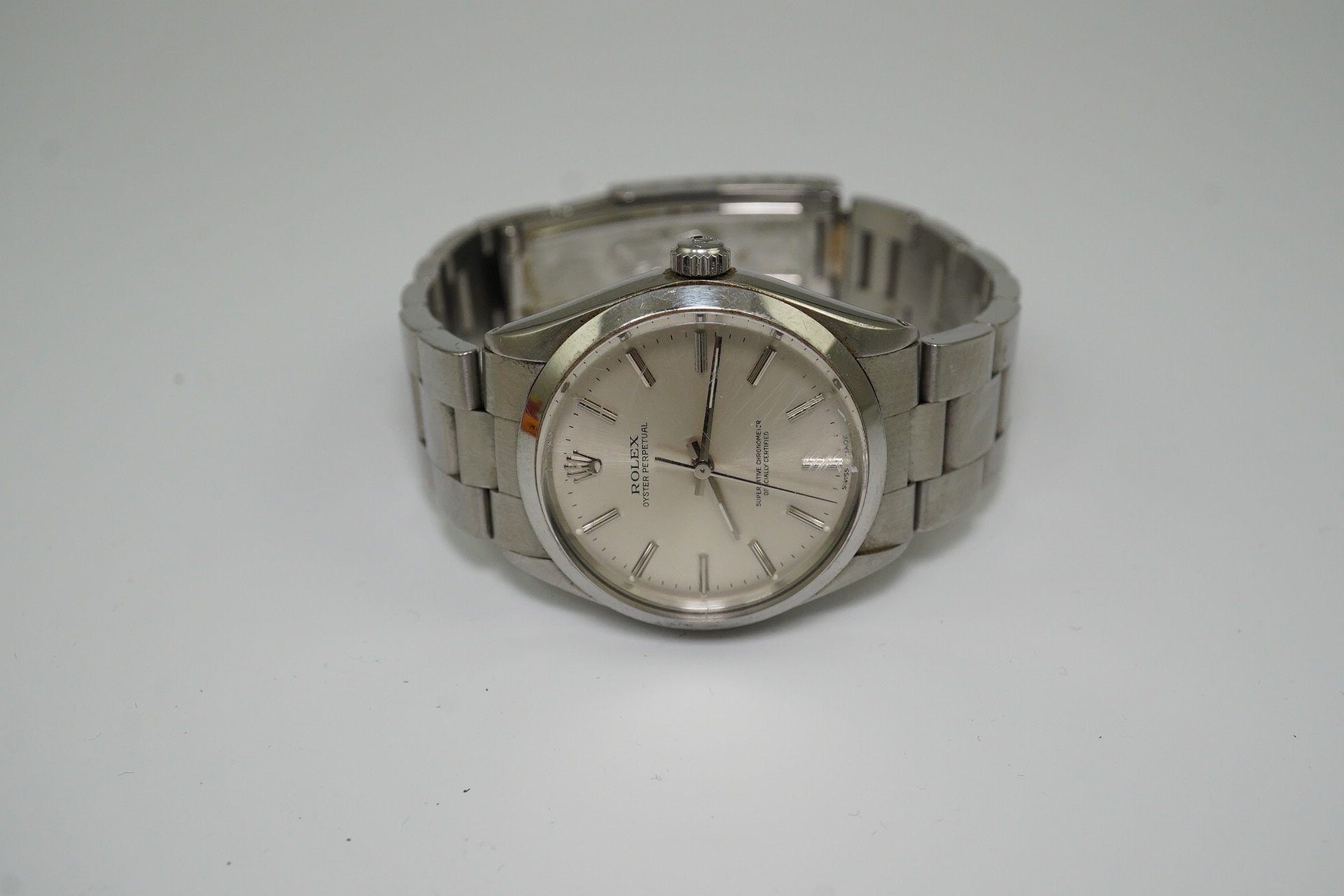 A gentleman's early 1980's stainless steel Rolex Oyster Perpetual wrist watch, on a stainless steel Rolex bracelet